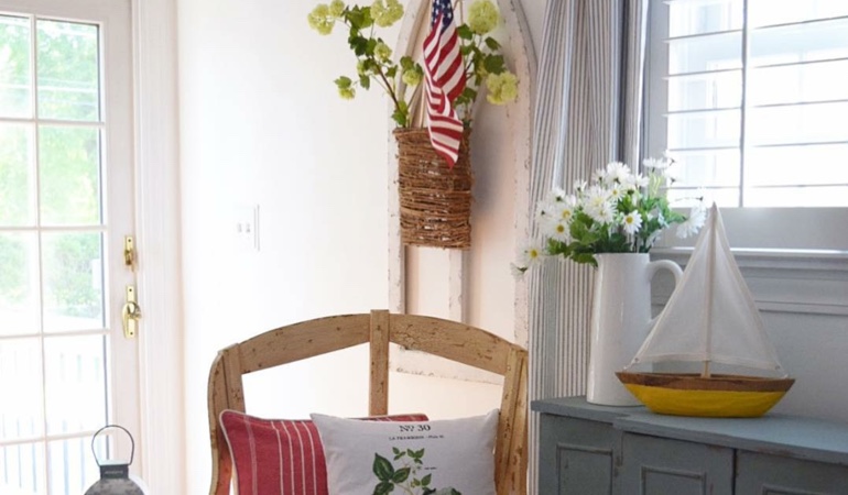 Bright sitting corner with faux wood plantation shutters in St. George. Faux wood plantation shutters in St. George