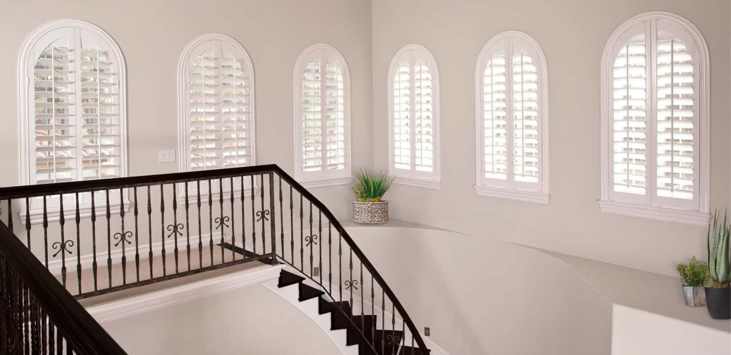 Custom-made treatments completely cover your window and smoothly open and close. Arched Plantation Shutters