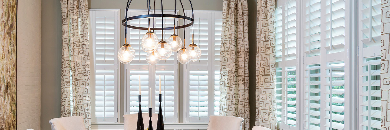 White polywood shutters in a dining room