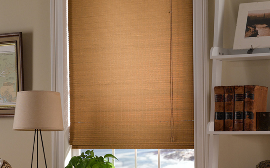 Add a touch of nature to your decor with woven fiber shades in St. George. Tan woven fiber shades in a living room