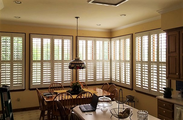 Polywood plantation shutters work well on large windows. Plantation shutters in kitchen